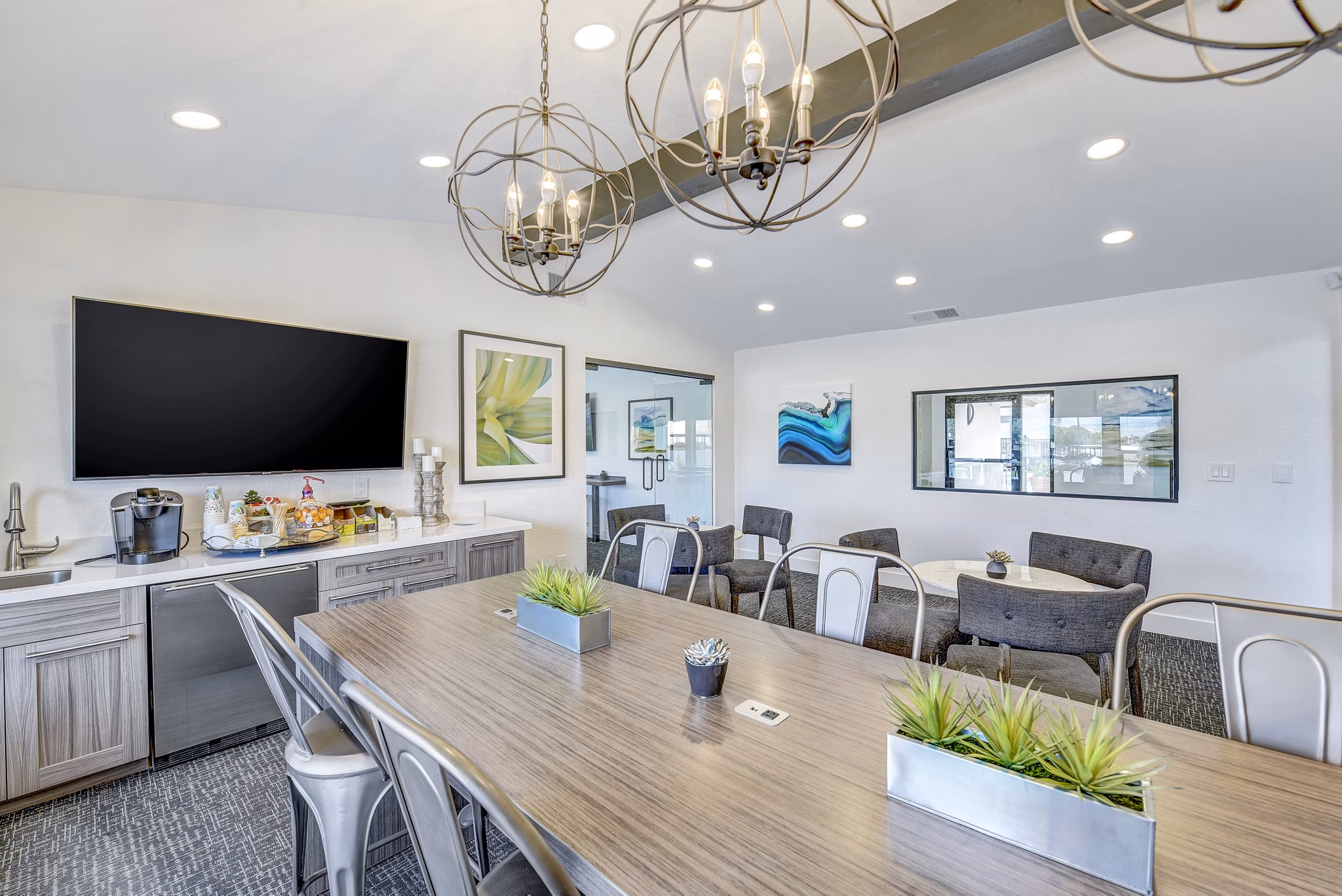 Clubhouse featuring modern design and comfortable seating at Altair Apartments