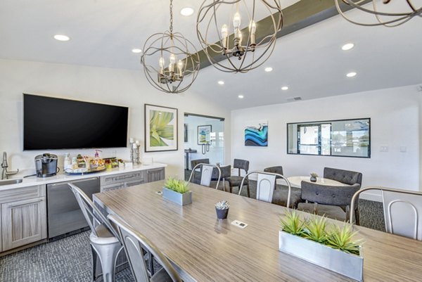 Clubhouse featuring modern design and comfortable seating at Altair Apartments
