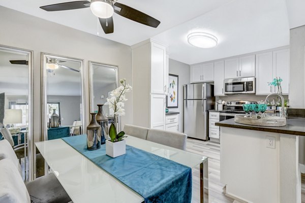 Dining room with modern furnishings at Altair Apartments in vibrant neighborhood