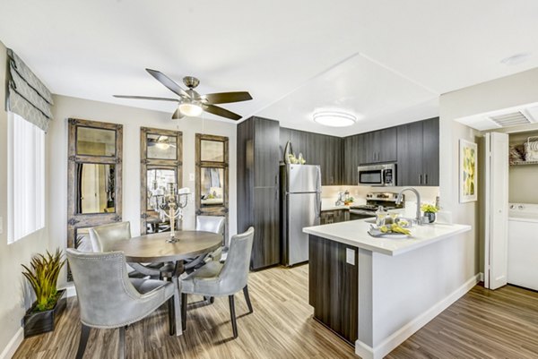 Modern dining room with elegant furnishings at Altair Apartments
