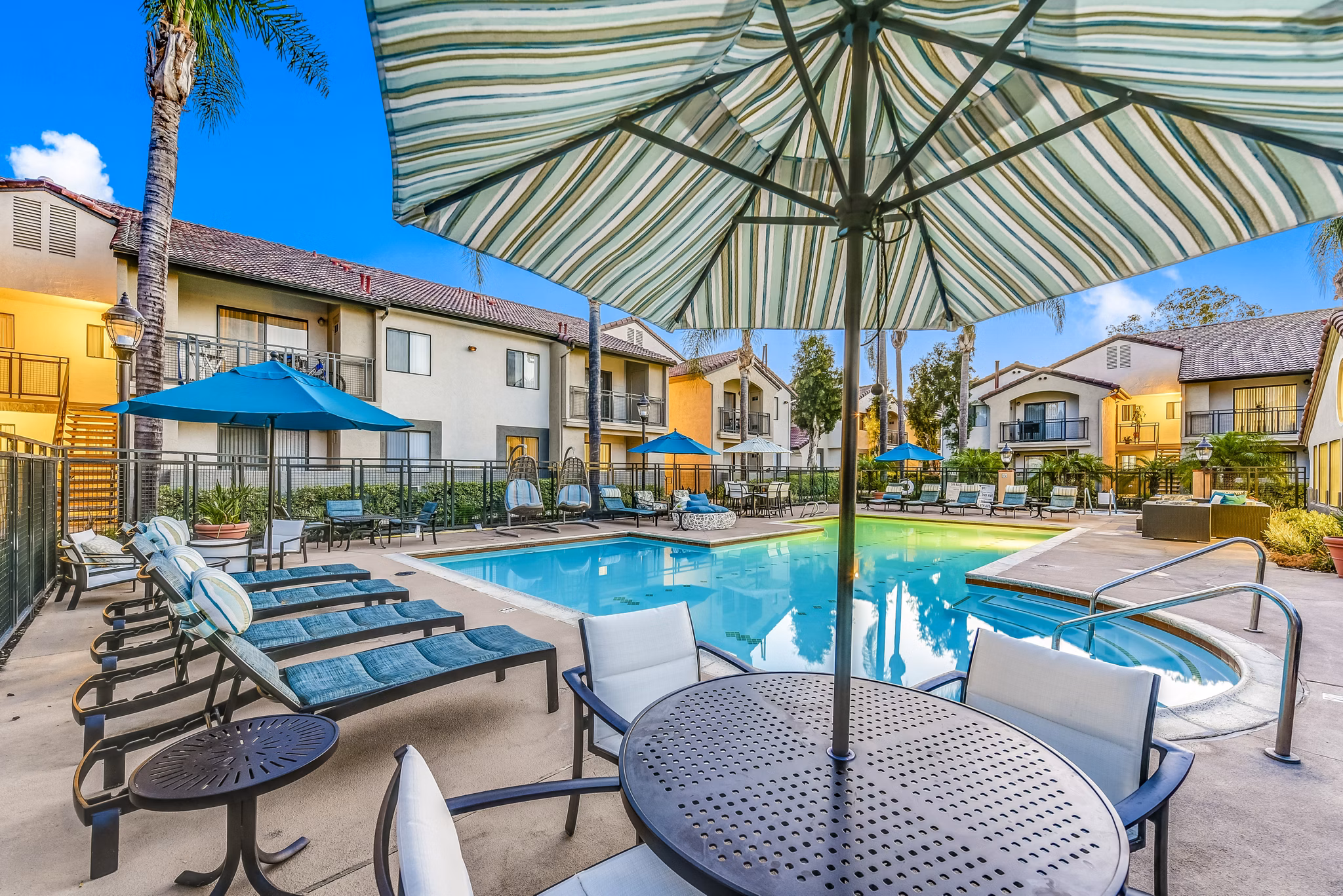 Relaxing outdoor pool at Altair Apartments, a Greystar luxury community, perfect for leisure and social gatherings