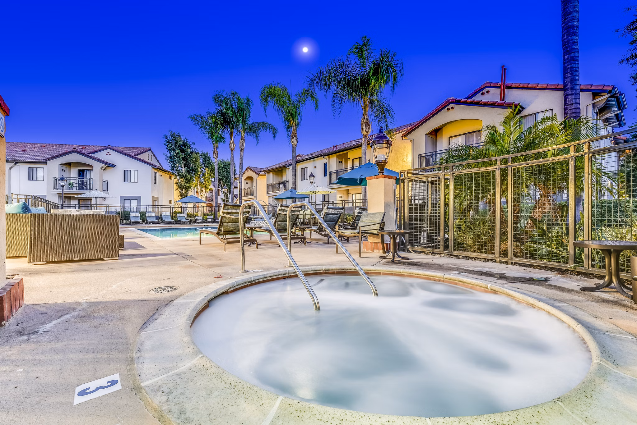 Luxurious hot tub at Altair Apartments with modern design and relaxation space