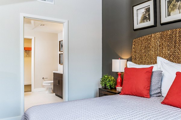 Cozy bedroom with modern decor at Altura Apartments