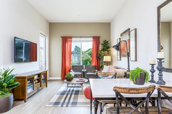 Elegant dining room with modern furnishings at Altura Apartments offering luxury living experience