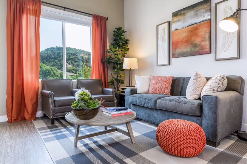Spacious living room with modern decor at Altura Apartments, ideal for luxury living