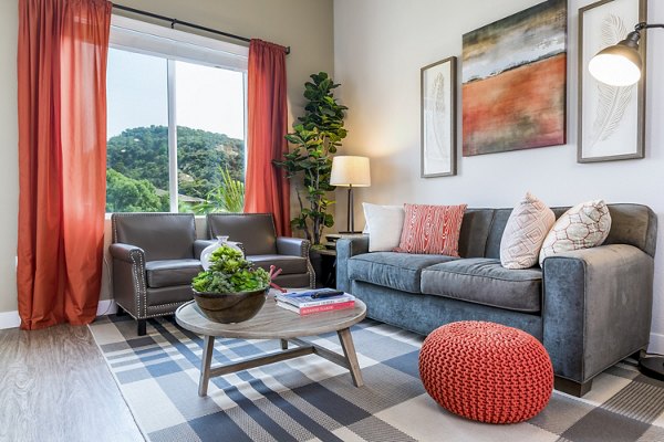 Spacious living room with modern decor at Altura Apartments, ideal for luxury living