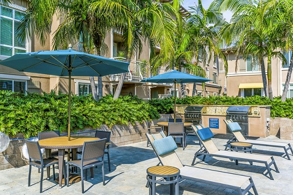 Grill area with modern seating at Altura Apartments, a luxury community