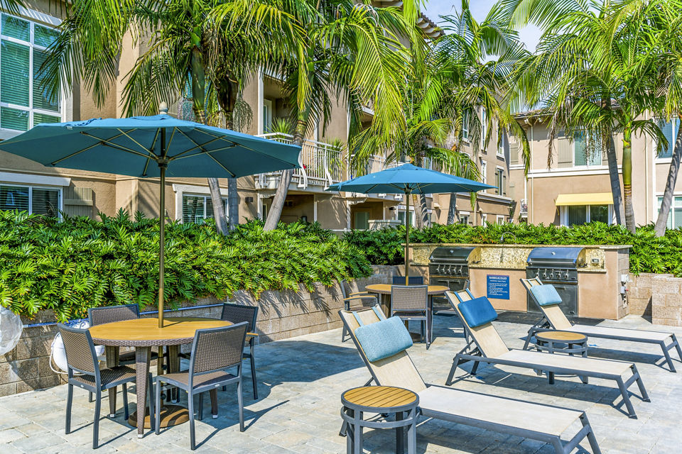 Grill area with modern seating at Altura Apartments, a luxury community