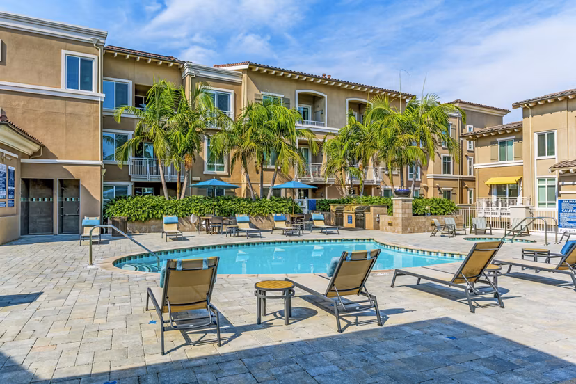Outdoor pool with sun deck at Altura Apartments providing luxury living experience in prime location