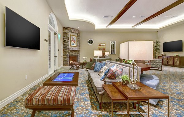 Modern clubhouse with sleek dÃ©cor at Avino Apartments, perfect for social gatherings and relaxation
