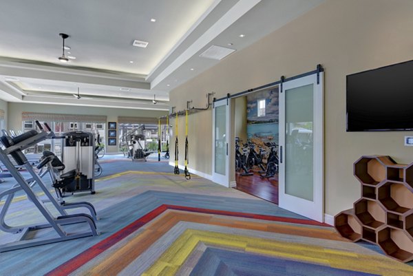 State-of-the-art fitness center with modern equipment at Avino Apartments for luxury living and wellness