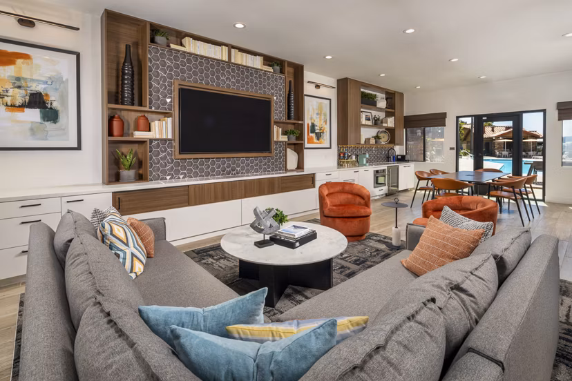 Modern clubhouse with spacious seating and entertainment areas at Bella Terra Apartments in vibrant luxury community