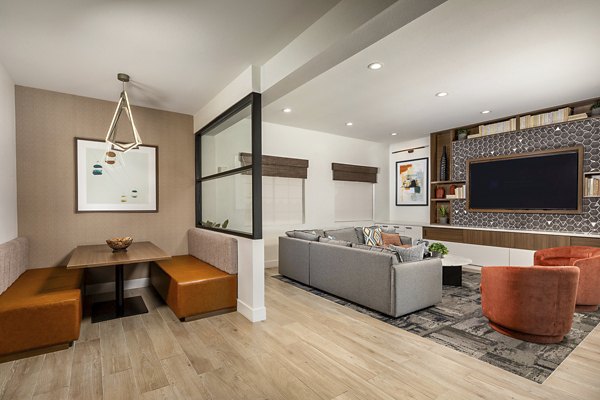 Clubhouse featuring modern decor and cozy seating at Bella Terra Apartments