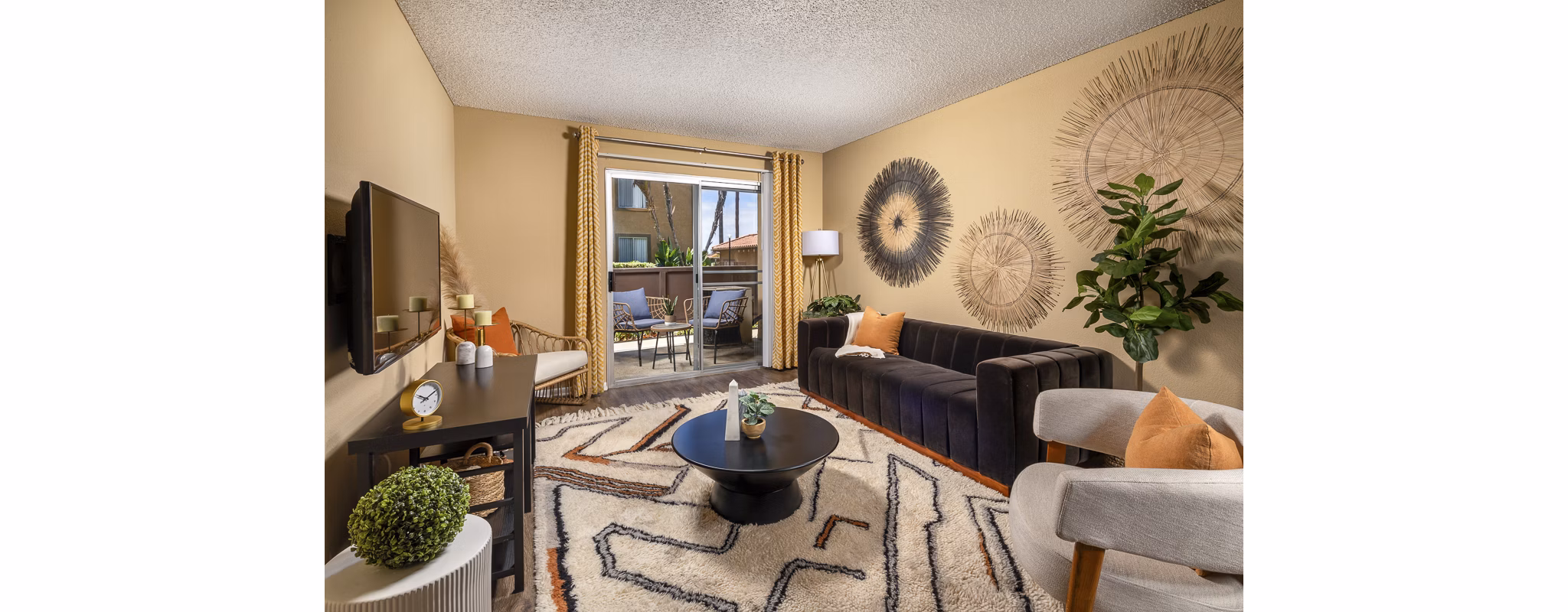 Cozy living room with modern furnishings at Bella Terra Apartments