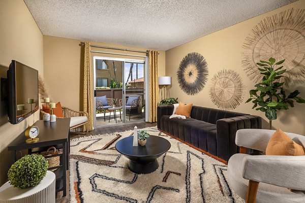 Cozy living room with modern furnishings at Bella Terra Apartments