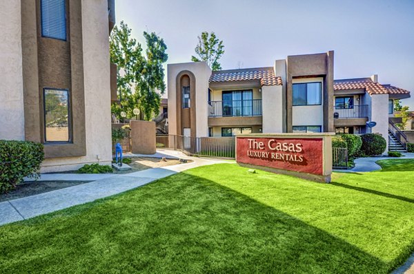 signage at The Casas Apartments