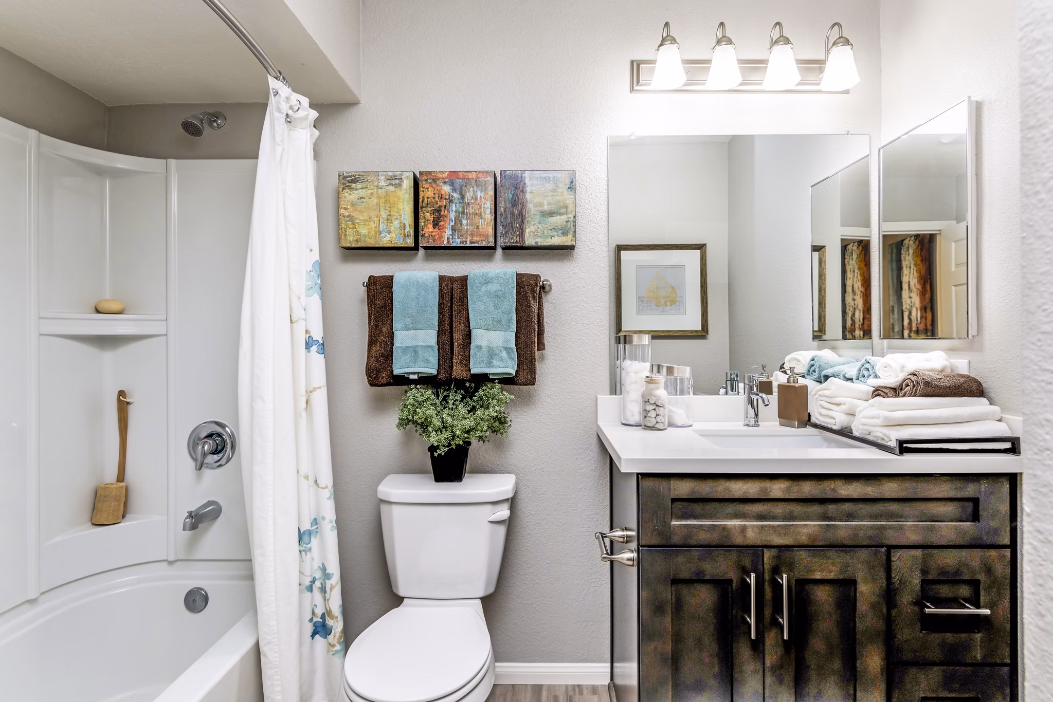Bathroom featuring modern fixtures and sleek design at The Casas Apartments