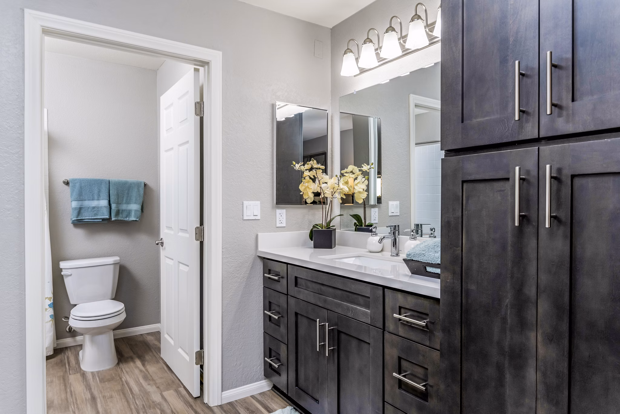 Bathroom with modern fixtures and sleek design at The Casas Apartments, Greystar luxury apartments