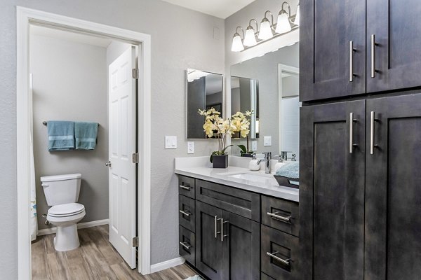 Bathroom with modern fixtures and sleek design at The Casas Apartments, Greystar luxury apartments