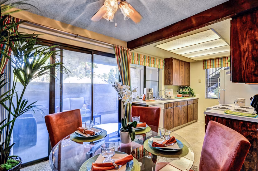 Dining room with modern decor and stylish furniture at The Casas Apartments, a Greystar luxury property in a prime location