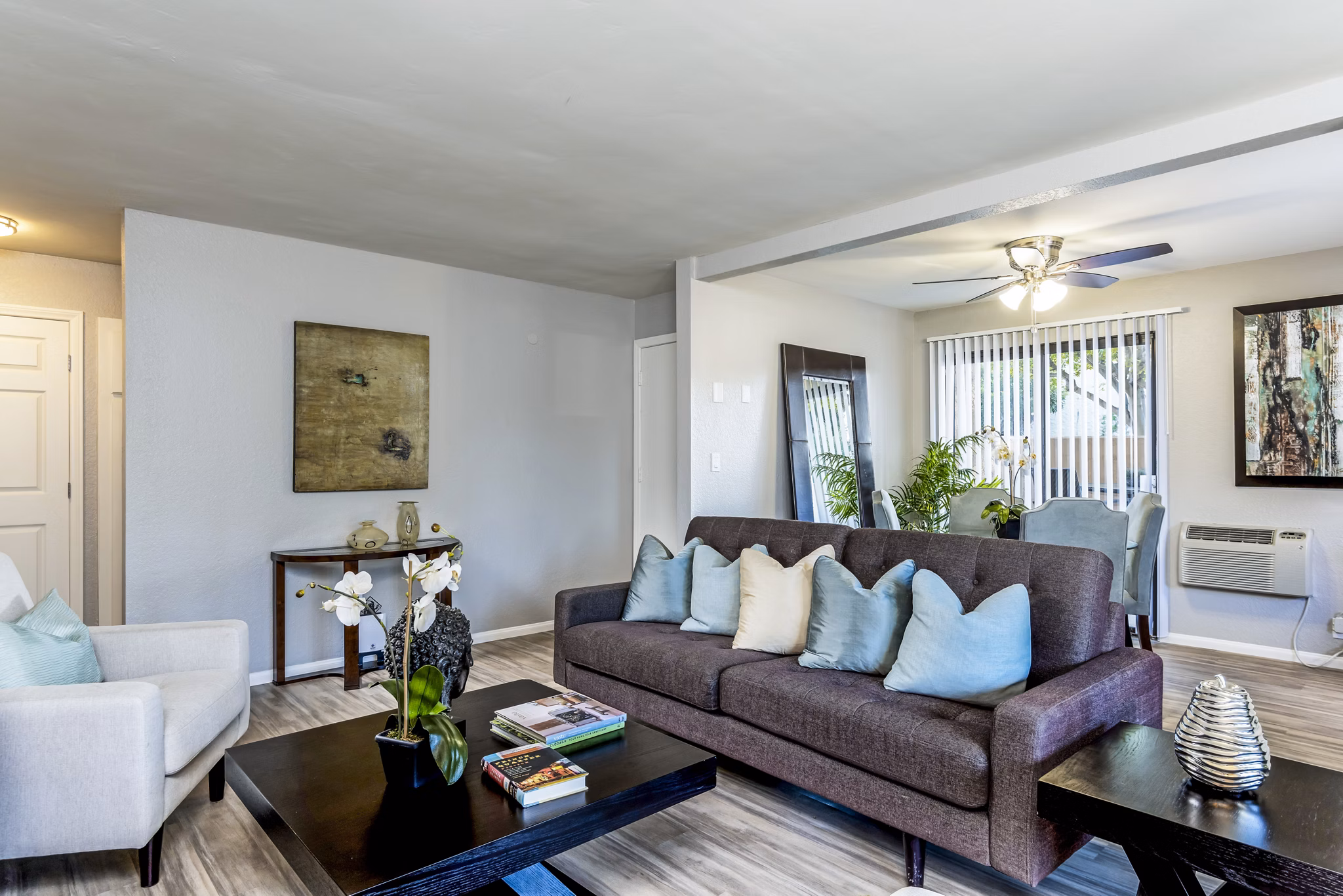 Modern living room with stylish furnishings at The Casas Apartments, a Greystar luxury community offering comfort and elegance