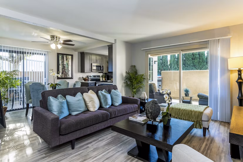 Spacious living room with modern decor at The Casas Apartments, luxury Greystar community