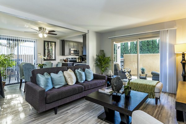 Spacious living room with modern decor at The Casas Apartments, luxury Greystar community