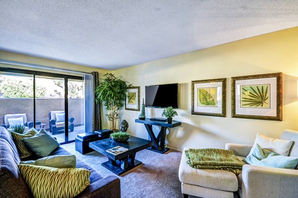 Modern living room with sleek furnishings at The Casas Apartments