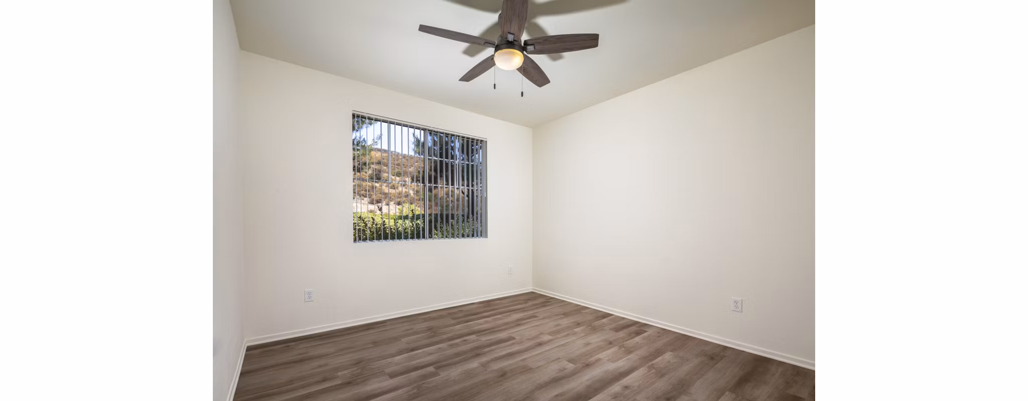 Clubhouse featuring modern design and seating at Casoleil Apartments, luxury living by Greystar