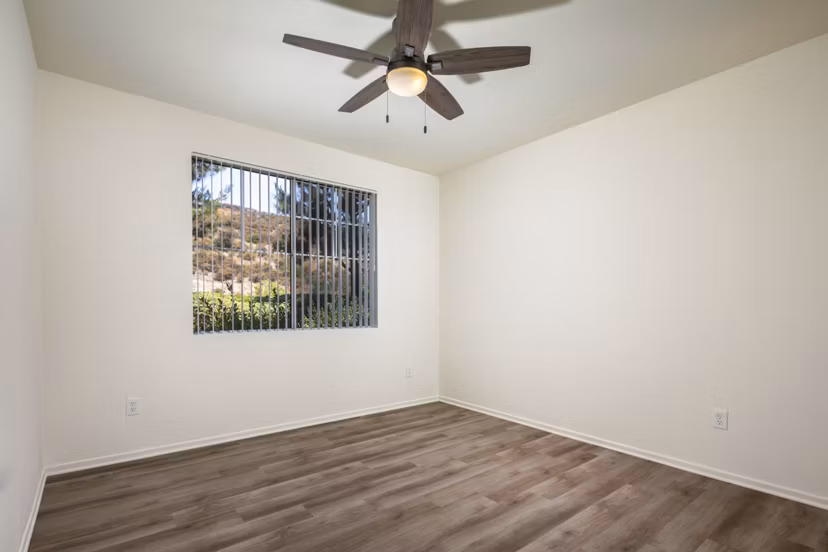Clubhouse featuring modern design and seating at Casoleil Apartments, luxury living by Greystar