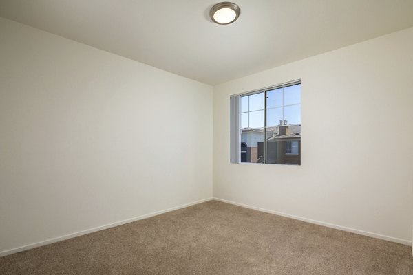 Clubhouse featuring modern decor and seating at Casoleil Apartments, a luxury community by Greystar