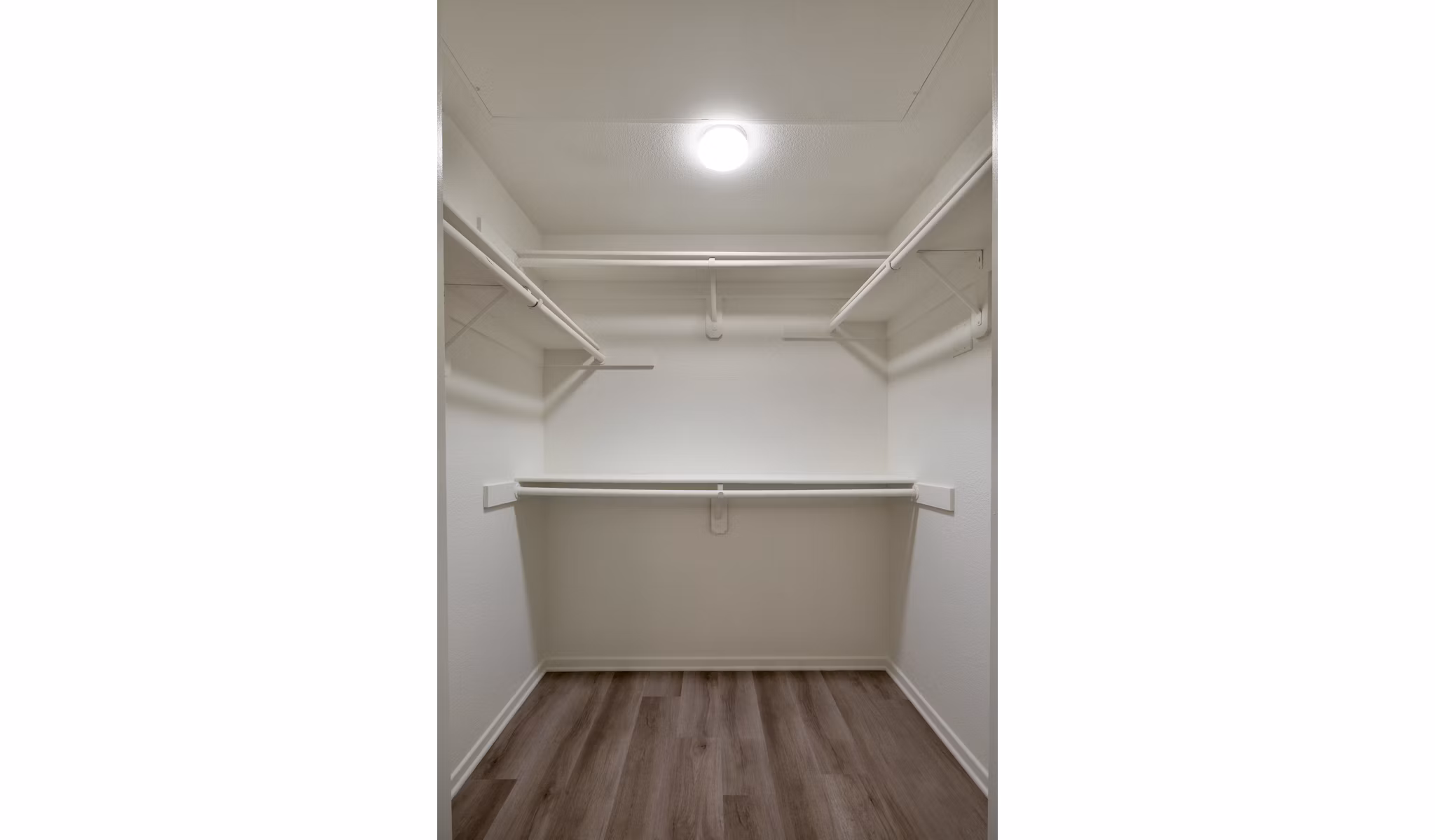 Clubhouse with modern decor and seating areas at Casoleil Apartments, a luxury community by Greystar