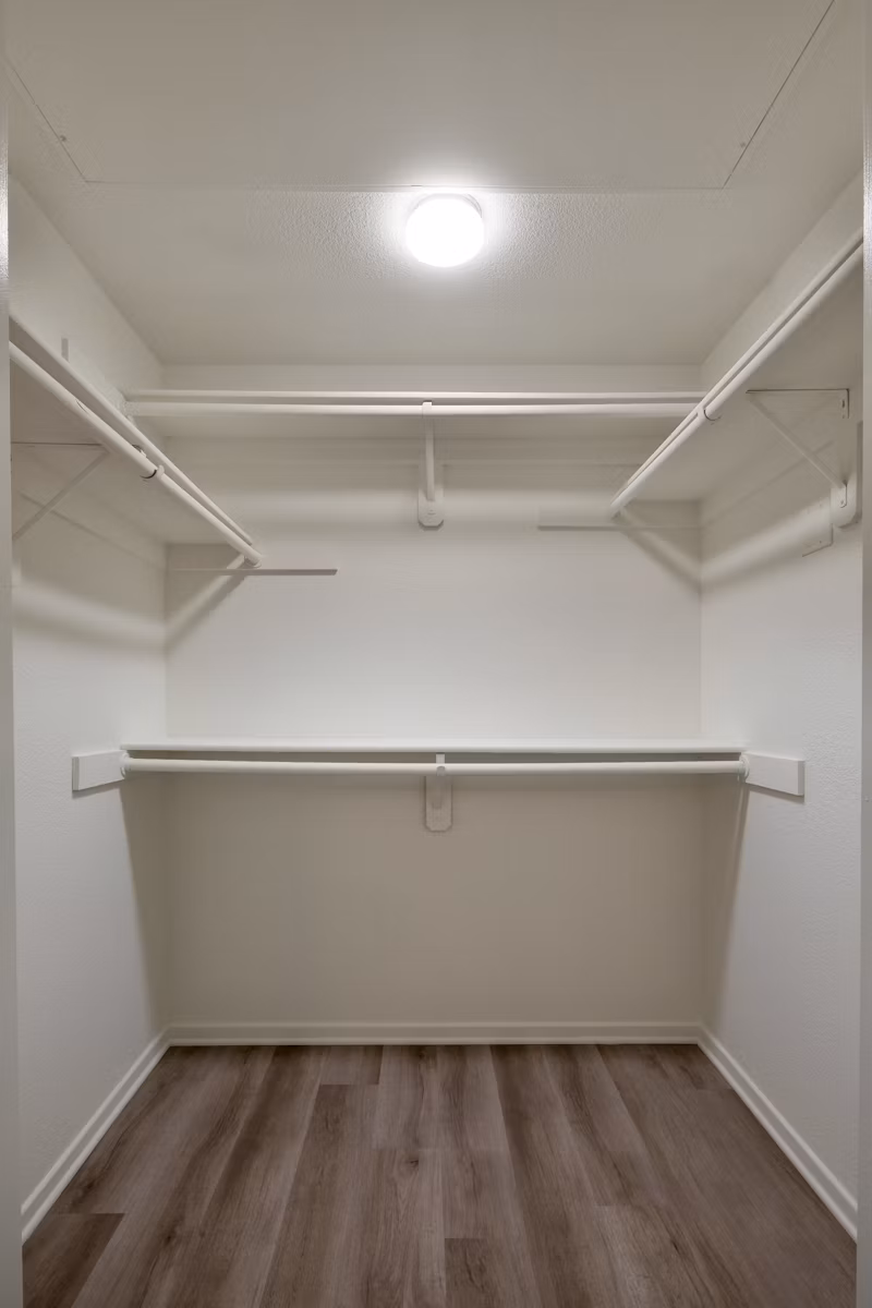Clubhouse with modern decor and seating areas at Casoleil Apartments, a luxury community by Greystar