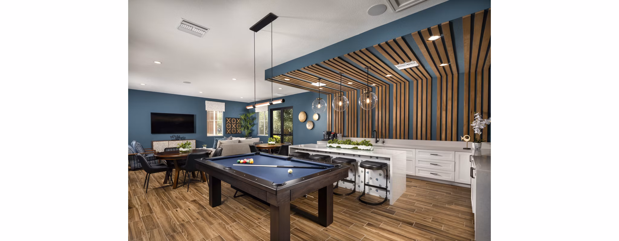 Clubhouse with modern design and lounge areas at Casoleil Apartments
