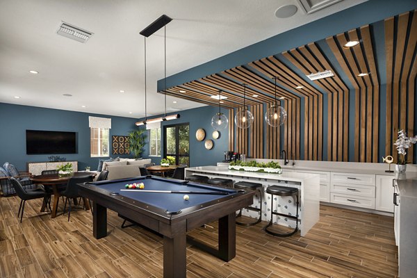 Clubhouse with modern design and lounge areas at Casoleil Apartments