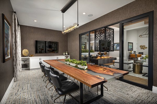 Elegant modern clubhouse featuring spacious seating and architectural design at Casoleil Apartments