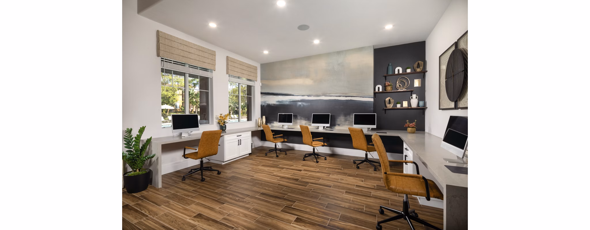 Clubhouse featuring modern seating and stylish decor at Casoleil Apartments, ideal for social gatherings and community events