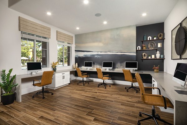 Clubhouse featuring modern seating and stylish decor at Casoleil Apartments, ideal for social gatherings and community events