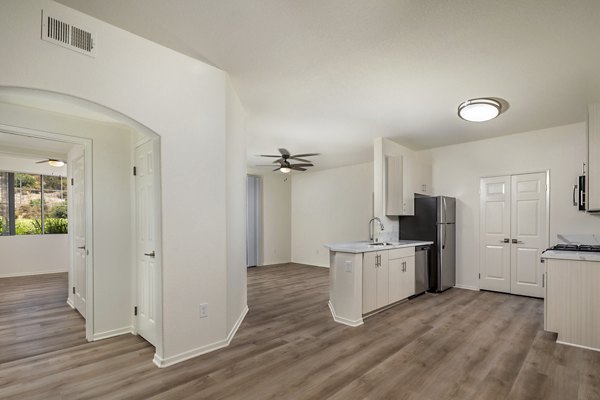 Welcoming clubhouse with modern furnishings at Casoleil Apartments, perfect for social gatherings and relaxation