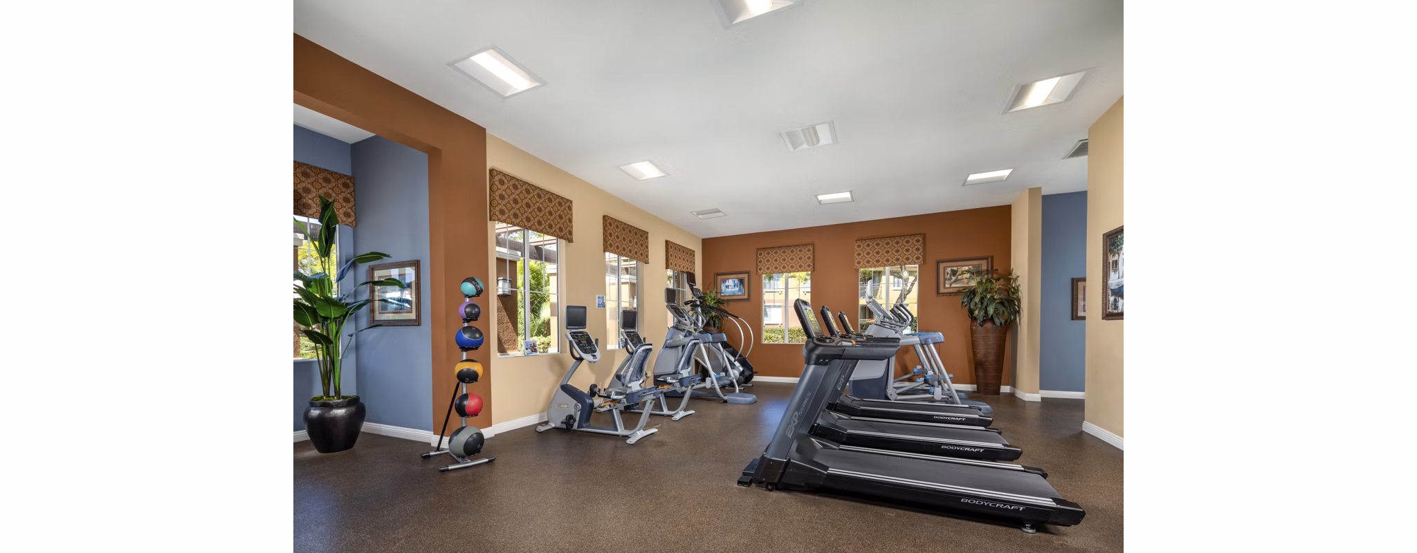 Modern fitness center with state-of-the-art equipment at Casoleil Apartments, a Greystar luxury community