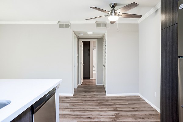Dining room with sleek modern decor at Central Park Apartments, luxury living spaces designed for comfort and style