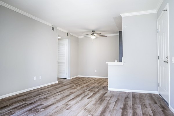 Cozy living room with stylish furnishings in Central Park Apartments, luxury apartments by Greystar