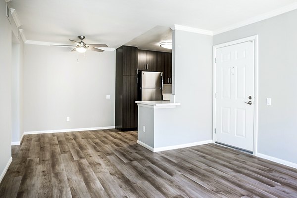 Contemporary living room with modern furnishings at Central Park Apartments featuring luxury design elements