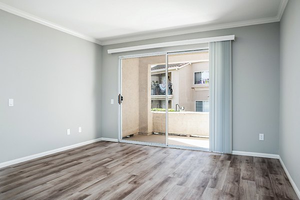 Living room featuring contemporary decor and plush seating at Central Park Apartments