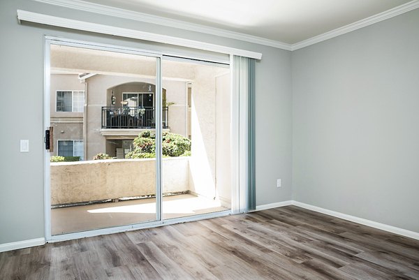 Elegant living room featuring chic furnishings and ample natural light at Central Park Apartments, part of Greystar's luxury apartment portfolio