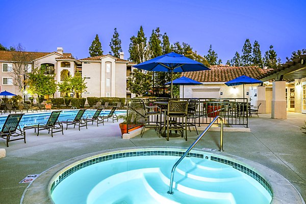Hot tub and jacuzzi at Central Park Apartments offering relaxation and luxury amenities