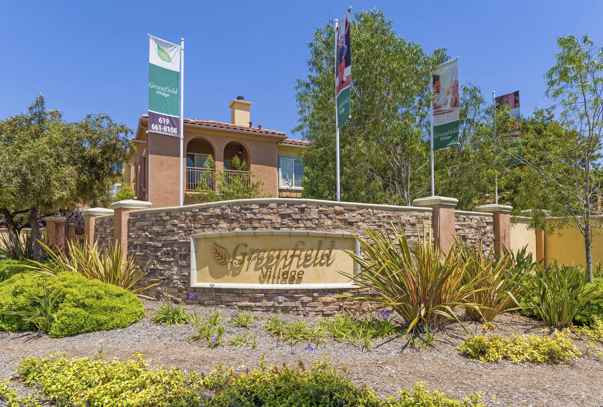 Greenfield Village Apartments: Modern signage for luxury living in a vibrant community