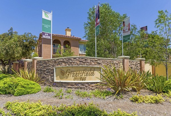 Greenfield Village Apartments: Modern signage for luxury living in a vibrant community