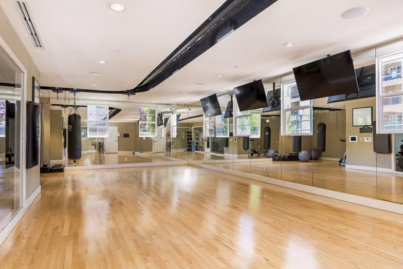 Modern yoga/spin studio with state-of-the-art equipment at Greenfield Village Apartments
