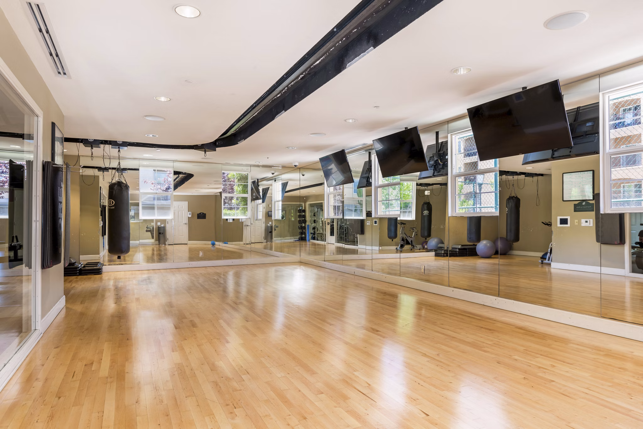Modern yoga/spin studio with state-of-the-art equipment at Greenfield Village Apartments